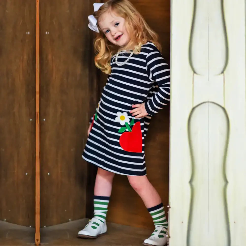 Image of a girl wearing New Balance trainers