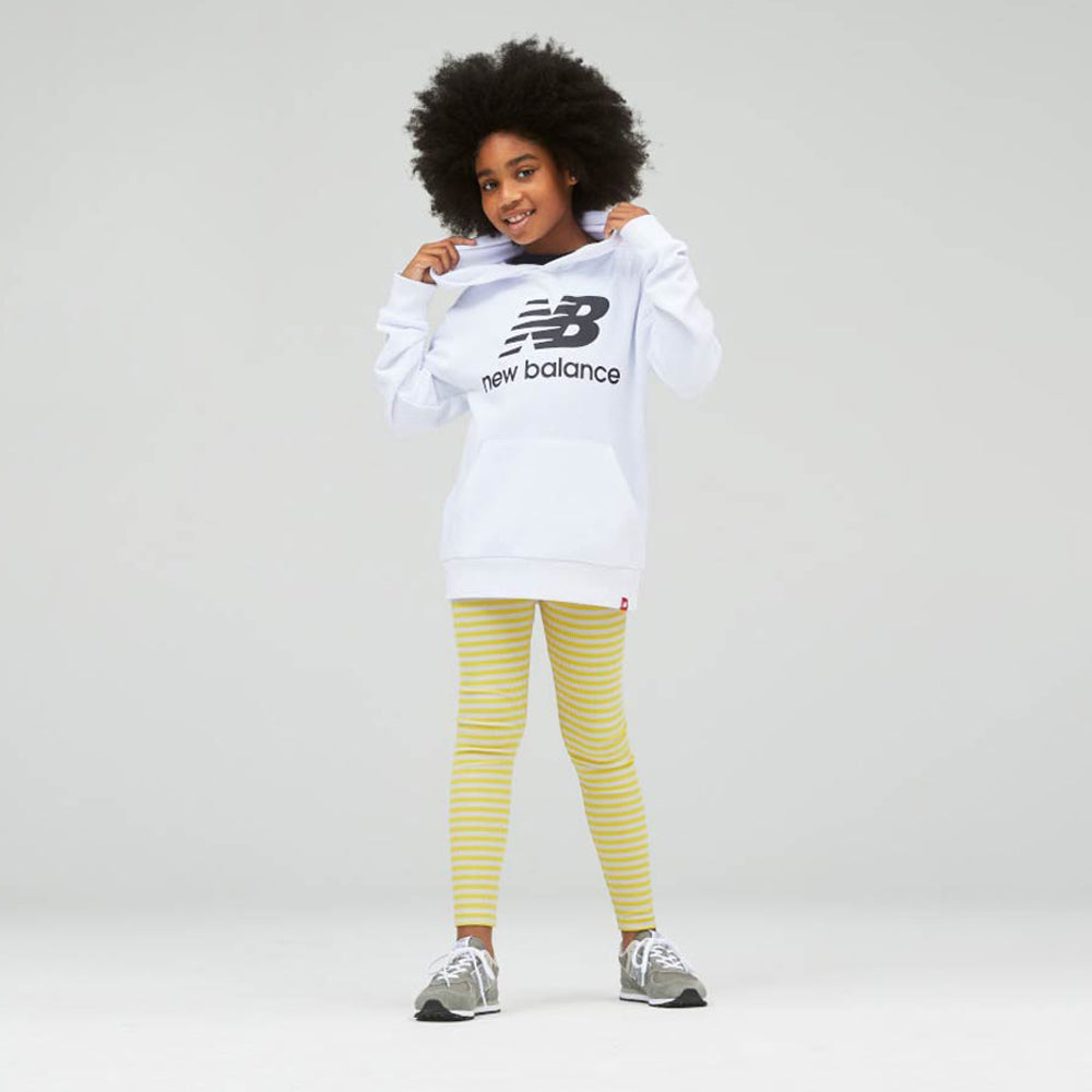 Image of a girl wearing New Balance trainers