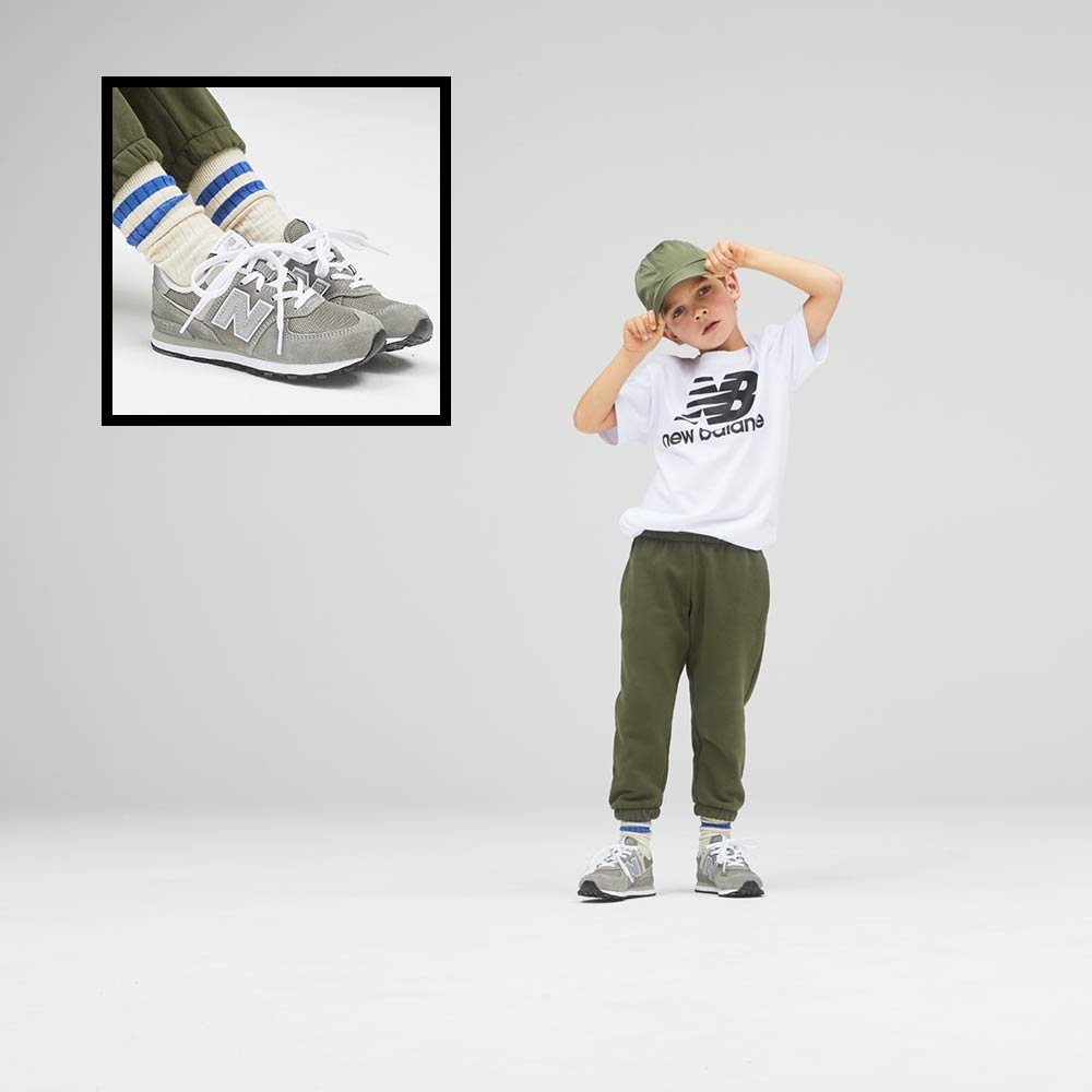 boy model wearing new balance gear and shoes